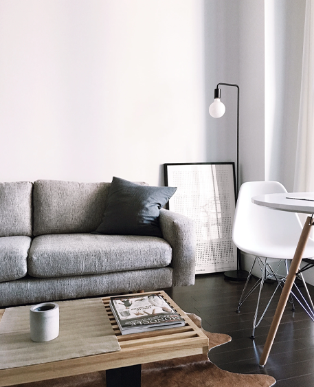 Styled living room with sofa and floor lamp